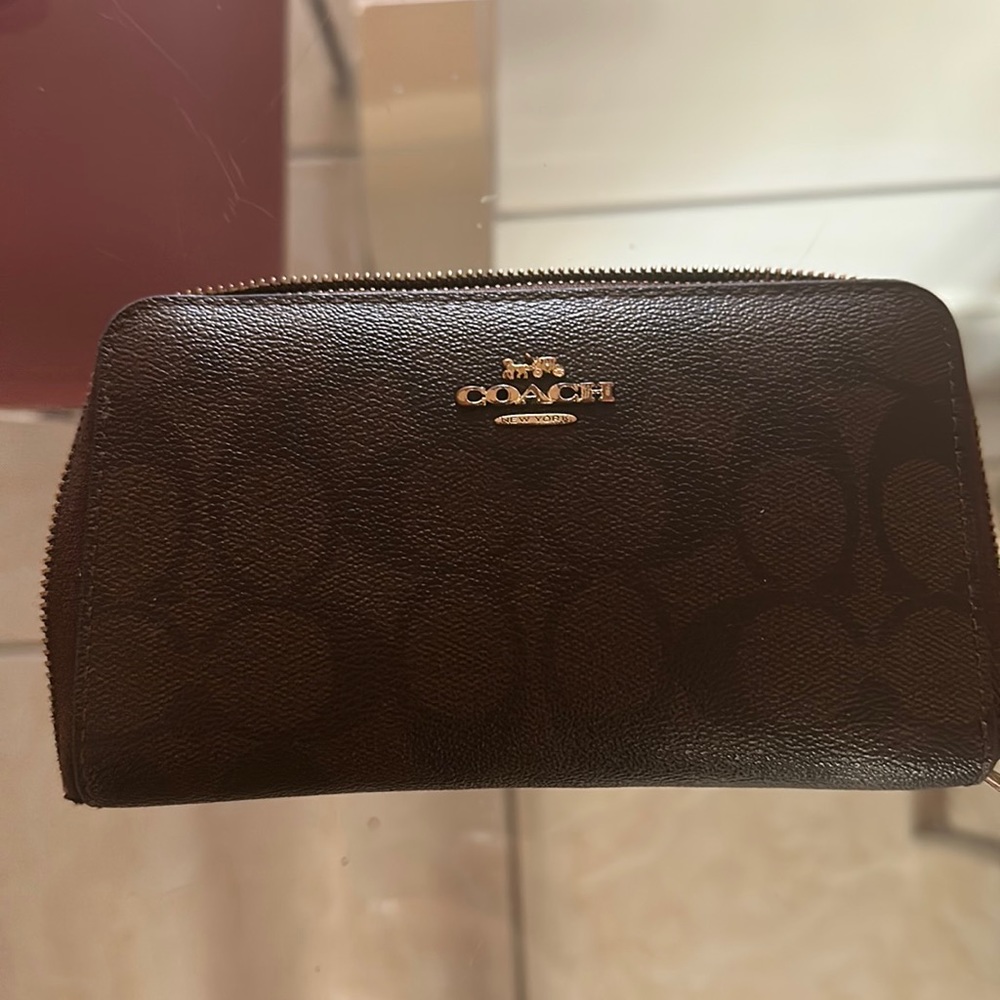 I have this beautiful wallet, very well taken care off.
